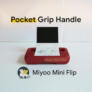May include: A dark red Pocket Grip Handle accessory for a white Miyoo Mini Flip handheld gaming console. The grip features a horizontal rectangular design with a central cutout for the device, which has a black screen and colorful buttons.