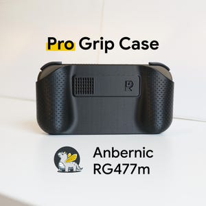 May include: A black Pro Grip Case for the Anbernic RG477m handheld gaming device. The case has a textured surface with a perforated grip area on each side. The Anbernic logo is visible on the case. The text "Pro Grip Case" is displayed in yellow.