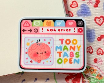 May include: A rectangular sticker with a light blue border. The sticker features a cartoon brain with the text "TOO MANY TABS OPEN". The design includes a computer window with icons and the words "404 error".