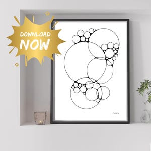 May include: Black and white abstract art print featuring interconnected circles of varying sizes. The artwork is framed in a black border and includes the text "DOWNLOAD NOW" in a gold burst graphic. The artist's signature "Frika" is in the bottom right corner.