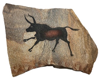 Lascaux Bull cave art painting on hanging stone