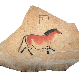 Lascaux Horse cave painting on hanging stone