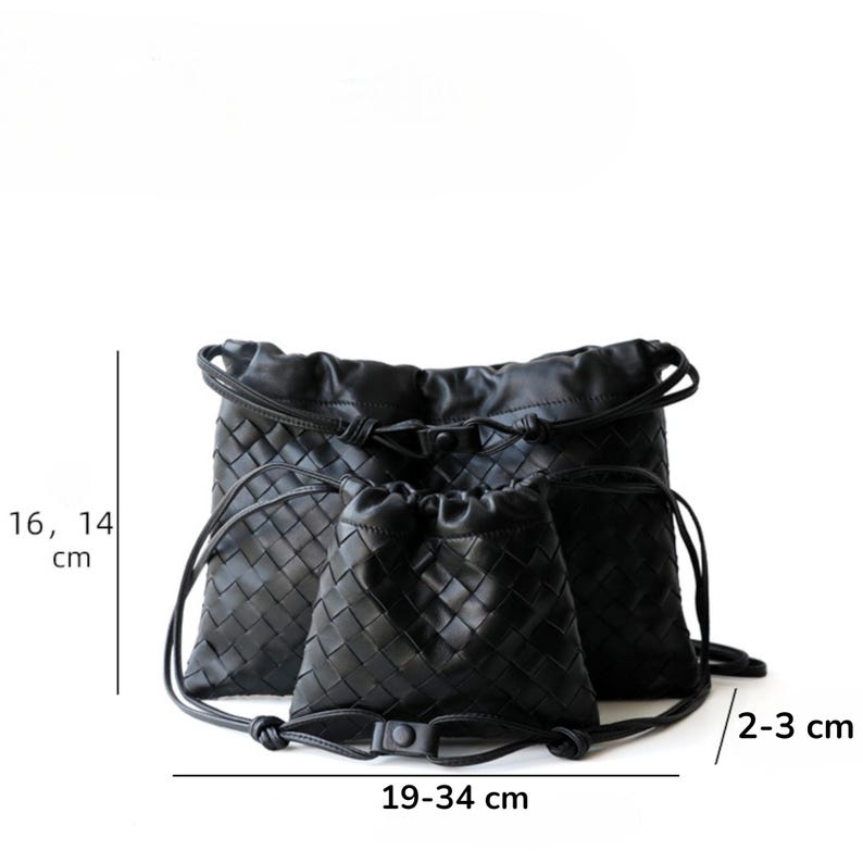 May include: Three black woven leather drawstring bags. The largest bag is 19-34 cm wide and 16 cm tall, the smallest is 14 cm tall. The bags have a drawstring closure and a woven pattern. The depth is 2-3 cm.