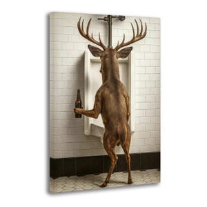 May include: A brown deer with large antlers standing on its hind legs in front of a white porcelain urinal mounted on a white subway tiled wall. The deer holds a brown glass beer bottle in one hoof while facing the urinal in a restroom setting.