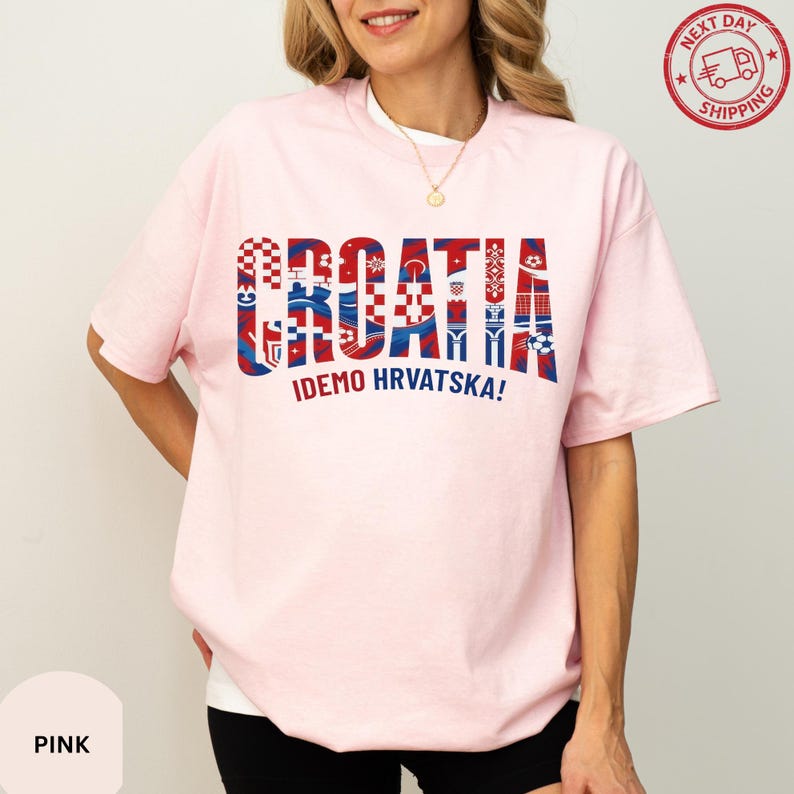 A woman wearing a pink t-shirt with the word "Croatia" printed on it.