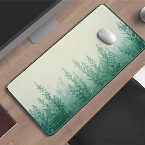 Può includere: Un set di tre ciotole in ceramica ad incastro nei toni del blu, verde e bianco. Le ciotole presentano una smaltatura maculata e un design semplice e moderno. La ciotola più grande misura circa 20 cm di diametro.