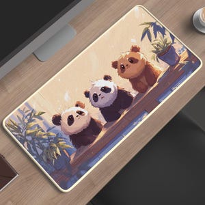 May include: A set of three ceramic mugs with a speckled, matte finish in cream, light grey, and dark grey. Each mug has a simple, minimalist design, suitable for coffee or tea.