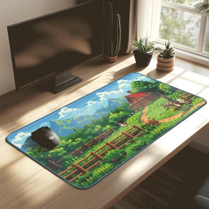 May include: A rectangular mousepad featuring a pixelated landscape with a cabin, mountains, and a blue sky. A black mouse sits on the left side of the pad. The pad has a blue border and a wooden fence.