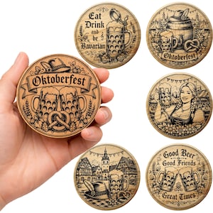 May include: A set of six round wooden coasters featuring laser-engraved Oktoberfest designs. Each coaster displays detailed illustrations of beer steins, pretzels, traditional hats, and German-themed text like Eat Drink and be Bavarian.