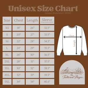 May include: A brown chart displays a unisex sweatshirt size guide. The chart includes chest, length, and sleeve measurements in inches for sizes XS to 5XL. A white sweatshirt graphic illustrates chest and length measurements. The Tattered Pages logo is in the bottom right.