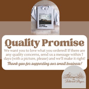 May include: A light gray sweatshirt with a graphic featuring a mountain landscape and the text "Basgiath War College." The sweatshirt is folded on a wooden surface. The image also includes text about a quality promise.