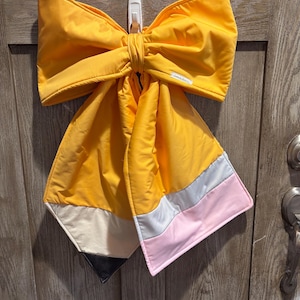 Oversized quilted bow door wreath hanger