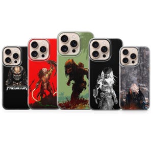 May include: Five smartphone cases featuring various Predator character illustrations. The designs include a black case with the Predator logo, a red case with a warrior, a green case with a stalking creature, a black case with a white figure, and a forest scene.