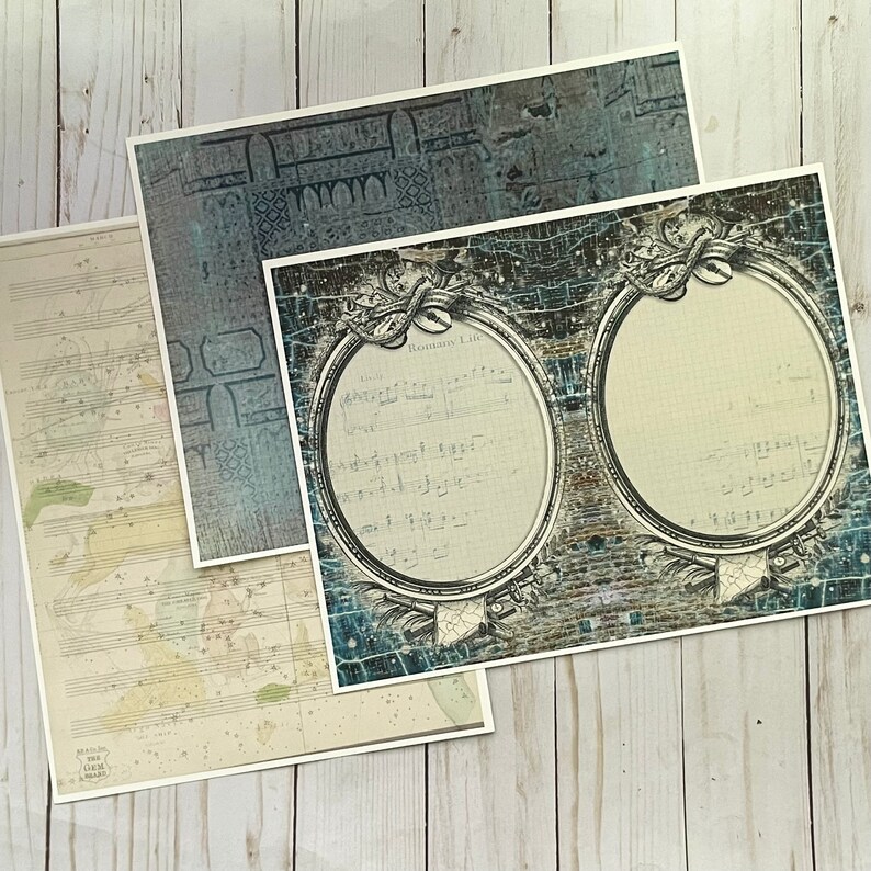 May include: Three vintage-style paper sheets with a blue and white patterned design. The top sheet has a faded blue and white pattern. The middle sheet has a blue and white pattern with a musical score and a circular frame. The bottom sheet has a faded blue and white pattern with a musical score.