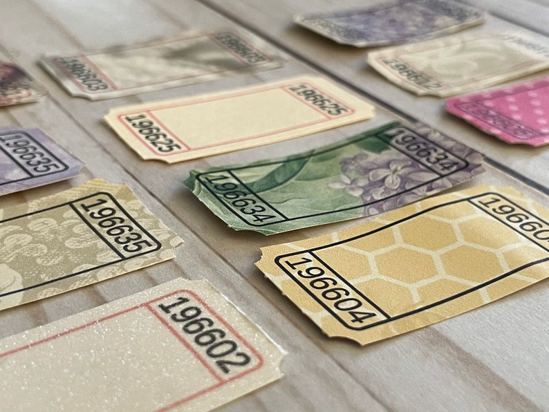 May include: A collection of vintage-style tickets with different designs and numbers. The tickets are printed on paper with a textured surface and have a faded, antique look. The numbers on the tickets are 196635, 196604, 196602, 196634, 196625, 196600, 196603, and 196601.