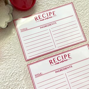 May include: Two blank recipe cards with red borders and the text "RECIPE - made with love" printed on them. Each card has a space for a title and a list of ingredients.