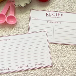 May include: Two blank recipe cards with pink lines. The top card has the title "RECIPE - made with love" and the heading "INGREDIENTS". The bottom card has the headings "DIRECTIONS", "PREP TIME", "COOK TIME", and "SERVES".