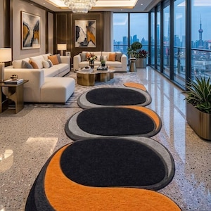May include: A modern living room with a city view, featuring a series of oval-shaped rugs in black, gray, and orange. The room includes white sofas, gold accents, and a large chandelier, creating a luxurious atmosphere.