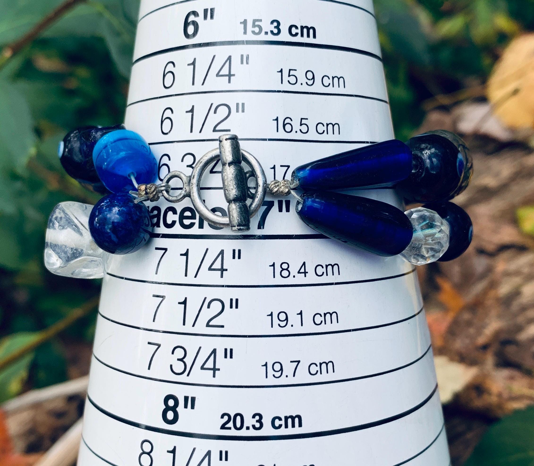 Jacques Couture Silver Tone Filigree Watch With Blue Glass 