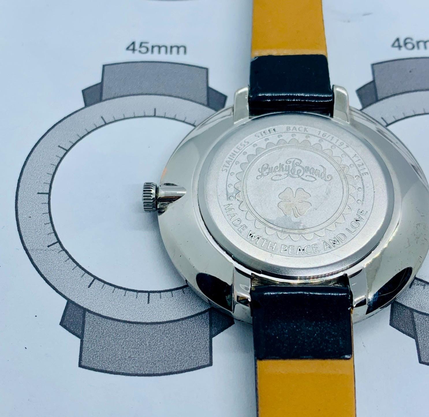 Y121e Lucky Brand Watch Peace And Love NWT New Lucky Brand Women's Watch  Gold Tone/Blacj Y121E No Box, Needs Battery, image size:1486x1445