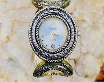 Embassy/Gruen GEM3576L Orologio con bracciale rigido ovale grande color argento/oro