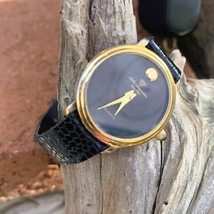 Jules Jurgensen 6561 Classic 80s Women&#39;s Gold Tone Round Black Leather Watch