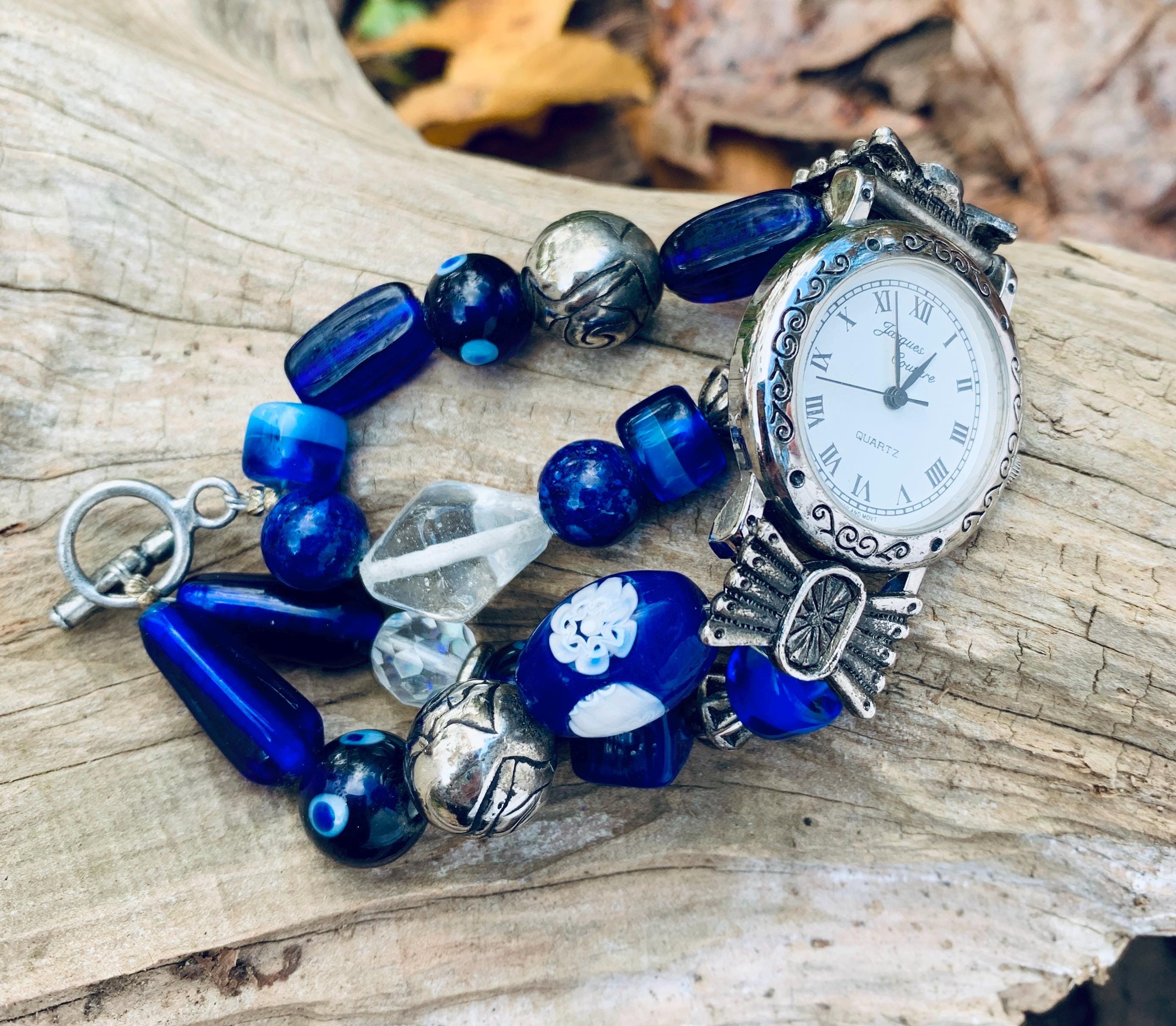 Jacques Couture Silver Tone Filigree Watch With Blue Glass 