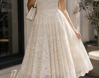 Falda larga de encaje con flores, fluida para viajes de verano, elegante para fiestas en color albaricoque.