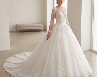 Vestido de novia francés estilo bosque, de tul y gasa, elegante y ajustado.
