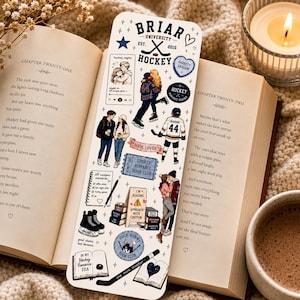 May include: A decorative bookmark featuring illustrations of hockey players, couples, and books. The bookmark has the text "Briar University Hockey" and other text. The bookmark is placed in an open book with text on the pages.
