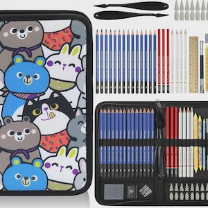 May include: A black zippered art case with a colorful cartoon animal design, open to reveal drawing pencils, blending stumps, erasers, and a ruler. Additional art supplies are arranged separately.