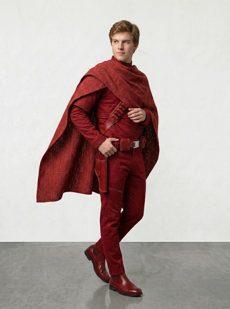 May include: A person in a red costume with a cape, long-sleeve shirt, pants, and boots. The costume includes a belt with a holster. The outfit is a solid, deep red color.