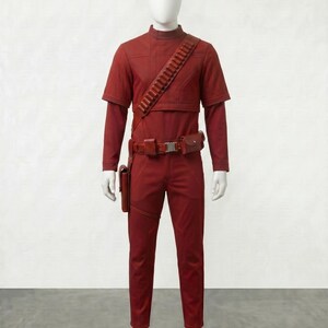 May include: A red costume displayed on a mannequin. The outfit includes a short-sleeved top over a long-sleeved shirt, pants, a belt with pouches, and a bandolier. The costume is a solid, deep red color.
