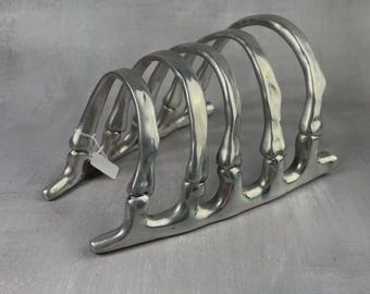 Soporte para cartas o tostadas con nervaduras de esqueleto, firmado y numerado por Michael Aram, diseño de aluminio fundido, mesa de escritorio vintage, objeto decorativo original.