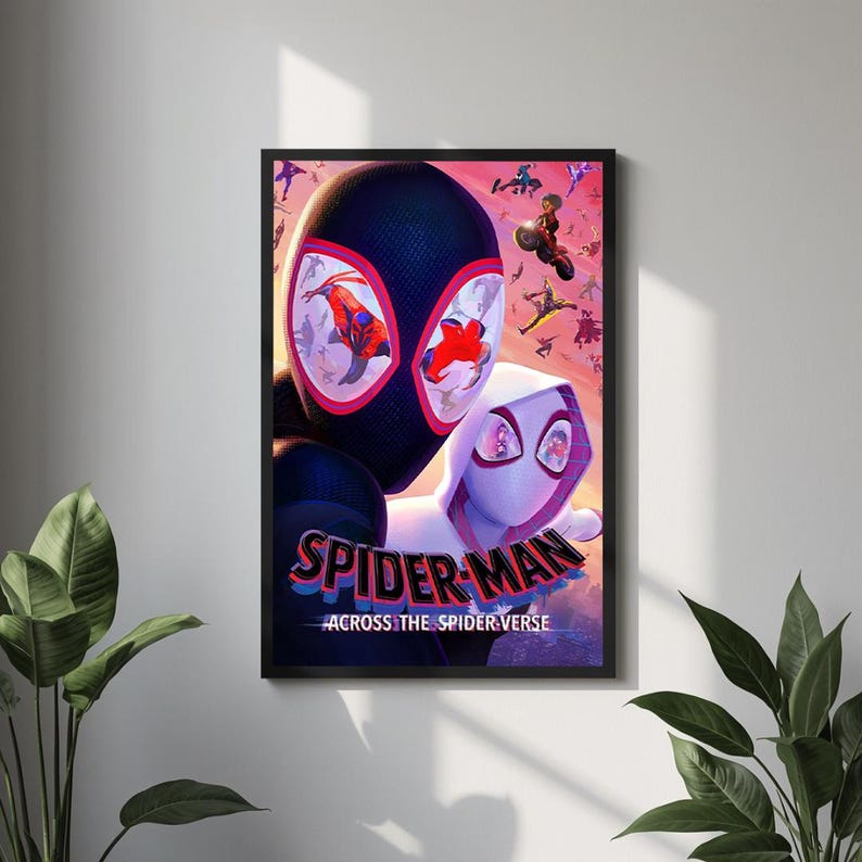 May include: Framed poster featuring Spider-Man characters from the movie "Across the Spider-Verse." The artwork showcases two Spider-Man figures with vibrant colors and dynamic poses. The title "SPIDER-MAN" is prominently displayed, with the tagline "ACROSS THE SPIDER-VERSE" below.