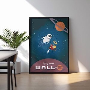 May include: A framed poster featuring characters from the Disney Pixar movie Wall-E. The artwork depicts the robots Wall-E and Eve in space, with a planet and stars in the background. The movie title is displayed in large letters at the bottom.