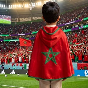 May include: A white ceramic mug with a black handle and the text "But First, Coffee" in a bold, black font. The mug is set against a blurred background, suggesting a cozy setting. The mug appears to be approximately 4 inches tall.