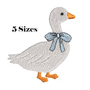 May include: An embroidered design of a goose with a light blue bow tie. The goose has grey feathers, orange feet and beak, and black eyes. The text "5 Sizes" is above the goose.