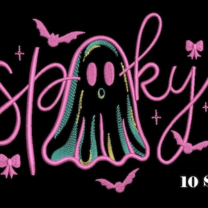 May include: An embroidery design on a black background featuring the pink cursive text "spooky" with a ghost replacing the letter "o". The design includes pink bats, small bows, and star accents. The text "10 Sizes" appears in the bottom right corner.