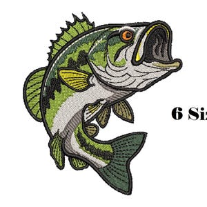 May include: An embroidered patch featuring a green and white largemouth bass fish with an open mouth, orange eye, and black outlines. The fish is depicted in a jumping motion with detailed scales and fins. The text 6 Sizes is printed in black.