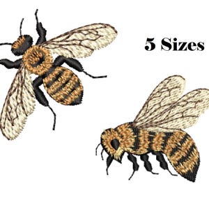 May include: Two embroidered bee designs in shades of brown, black, and cream are displayed against a white background. One bee is shown in flight, while the other is positioned horizontally. The text "5 Sizes" is also present.