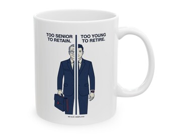 Layoff Humor Ceramic Mug | Too Senior to Retain, Too Young to Retire Quote