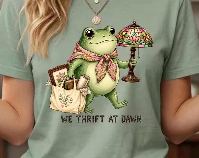 Thriftstore Frog Tee | T-Shirt featuring Frog with Lamp and Shopping Bags