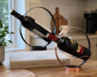 Botellero redondo, soporte de metal único para botellas de vino, regalo de decoración para bar en casa, expositor circular moderno, botellero minimalista de mesa