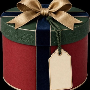 A round cylindrical gift box with a red base, green lid, blue velvet ribbon, gold bow, and a blank gift tag.