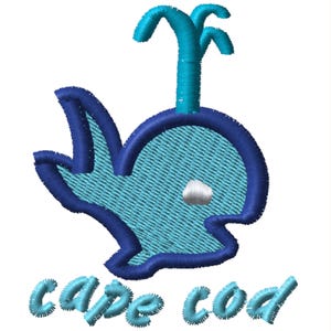 May include: Embroidered design featuring a stylized whale in shades of blue, with a white eye and a water spout. The text "cape cod" is embroidered below the whale in a matching blue color. The design is on a white background.