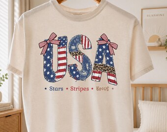 USA Stars Stripes Bows Graphic Tee, Patriotic Fourth of July Shirt, Coquette Leopard T-Shirt