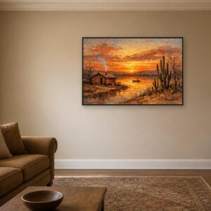 May include: A rectangular landscape painting featuring a cabin with smoke rising from the chimney, a small boat on a calm body of water, and a tall cactus in the foreground. The scene is set during a vibrant sunset with orange and yellow clouds.