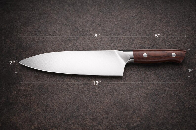 May include: A stainless steel chef's knife with a dark brown wooden handle. The blade is 13 inches long, 2 inches wide, and the handle is 5 inches long. The knife is 8 inches from the blade's tip to the handle's base, and the handle is 1 inch thick.