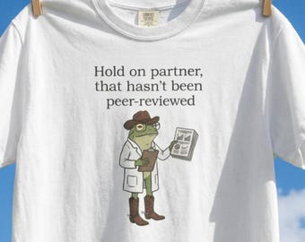 Hold on Partner That Hasn't Been Peer Reviewed Funny Science Shirt, Researcher Gift, Academic Cowboy Frog Graphic